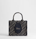 Women's Small Book Tote with Blue Oblique Jacquard and Médaillon Signature