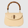 Women's Small Top Handle Bag With Soft Grainy Leather And Click Closure